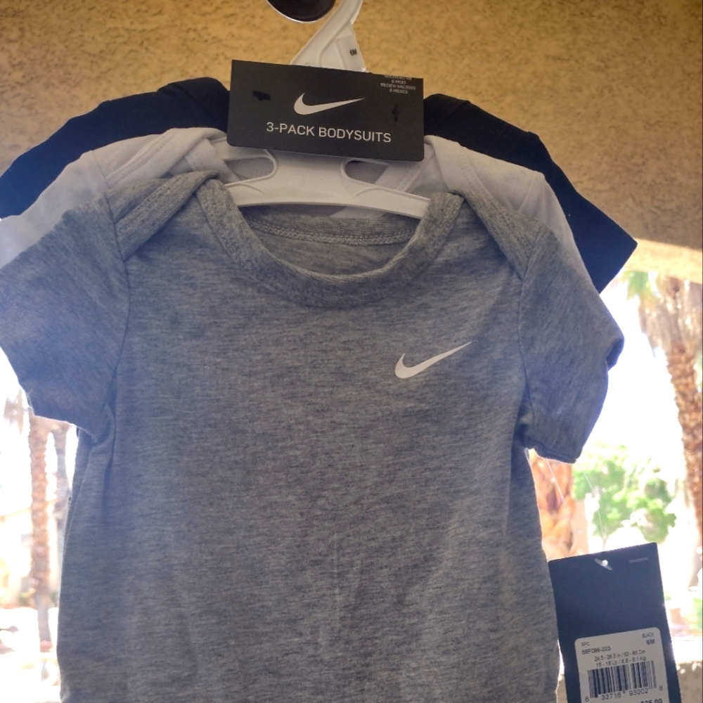 Set of 3 onesies Nike Swoosh logo size 6 months